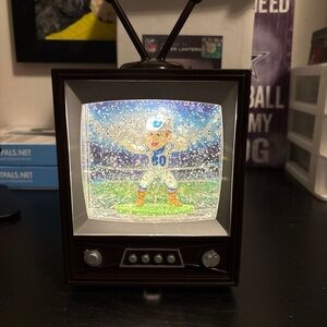 NFL Snow Globe TV with Football Player - Black and Blue